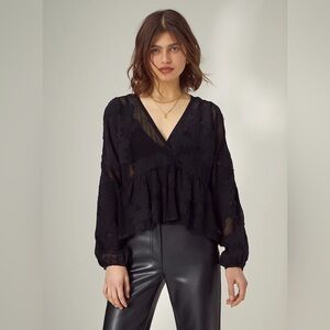 Aritzia Wilfred peplum blouse in black size medium
